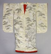 A SUPERB LARGE CREAM GROUND SILK AND SILVER COLOUR THREAD KIMONO, embroidered with cranes in a