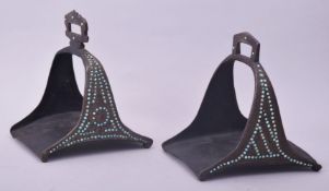 TWO FINE 19TH CENTURY PERSIAN QAJAR TURQUOISE INSET STEEL STIRRUPS, each approx. 16cm long.