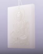A CHINESE CARVED JADE RECTANGULAR AMULET, carved with a buddha, 7.5cm x 5cm.
