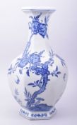 A LARGE CHINESE BLUE AND WHITE PORCELAIN HEXAGONAL VASE, decorated with peach blossom, the base with