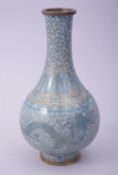 A SMALL CHINESE CLOISONNE TURQUOISE GROUND VASE, decorated with dragons and the flaming pearl of