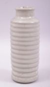 A CHINESE CRACKLE GLAZED RIBBED PORCELAIN VASE, 17cm high.