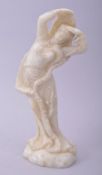 A CHINESE SOAPSTONE CARVING OF A FEMALE FIGURE, 20cm high.