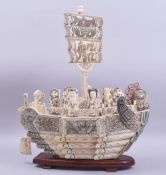 A JAPANESE MEIJI PERIOD SECTION IVORY STAINED TREASURE SHIP / TAKARABUNE, consisting of the seven