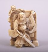 A GOOD JAPANESE CARVED IVORY OKIMONO of a figure with a sword and a demonic figure aloft, the