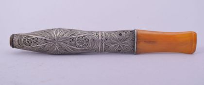 A FINE OTTOMAN FILIGREE SILVER AND AMBER HUQQA MOUTHPIECE, 15cm long.
