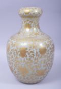 A GOOD CHINESE CELADON GLAZE AND GILT DECORATED GARLIC HEAD VASE, the body painted all over with
