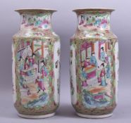 A PAIR OF CHINESE CANTON FAMILLE ROSE PORCELAIN LANTERN VASES, each with panels of figures, with