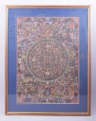A LARGE INDIAN THANGKA, framed and glazed.