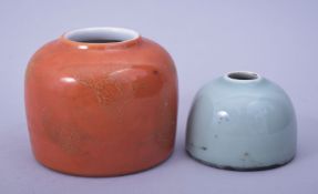 TWO CHINESE PORCELAIN INK WASHERS, one with coral glaze and gilt butterflies, six character mark