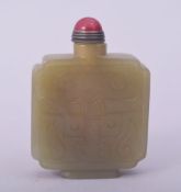 A CHINESE CARVED JADE SNUFF BOTTLE AND STOPPER, 6cm.