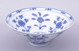 A CHINESE MING STYLE BLUE AND WHITE PORCELAIN BOWL, the interior and exterior both painted with