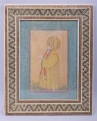 A PERSIAN QAJAR MINIATURE PAINTING OF A FIGURE, in a micro mosaic inlaid frame, framed and glazed,