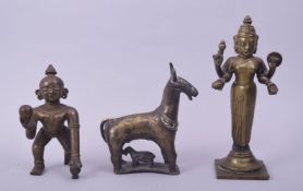 A COLLECTION OF THREE INDIAN BRONZES, including two figures of deities and a nandi bull (3).