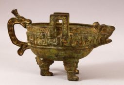 A CHINESE ARCHAIC STYLE TWIN HANDLE LIBATION / POURING VESSEL - with archaic style decoration in the