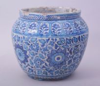 A FINE 19TH CENTURY MULTAN POTTERY VASE, painted with large flower heads and other foliate motifs,