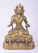 A GILT BRONZE BUDDHISTIC FIGURE, 18cm high.