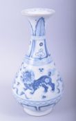 A CHINESE BLUE AND WHITE PORCELAIN YUHUCHUN VASE, the body painted with kylin, 30cm high.