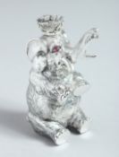 A MOULDED WHITE METAL ELEPHANT PERFUME BOTTLE