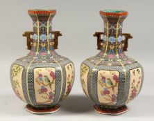 A PAIR OF CHINESE PORCELAIN HEXAGONAL VASES 12ins high.