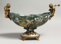 A BOAT SHAPED PORCELAIN COMPORT painted with parrots and flowers with gilt mounts. 11ins long.