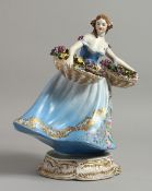 GUIDO CACCIAPUOTI (CIRCA. 1930 - 1940) A YOUNG LADY HOLDING TWO BASKETS OF FLOWERS Incised signature