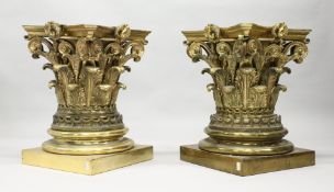 A GOOD PAIR OF LARGE CAST BRASS CORINTHIAN COLUMN CAPITALS, each standing on a square base with