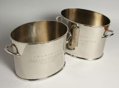 A PAIR OF ALFRED GRATIEN OVAL SILVER-PLATED CHAMPAGNE COOLERS 9ins wide.