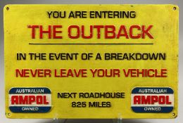 A CAST IRON YELLOW OUTBACK SIGN. 15ins x 23ins.