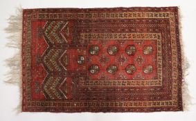 A SMALL BOKHARA PRAYER RUG. 4ft x 2ft 8ins.