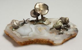 A SILVER AND ONYX GROUP a snail, two birds and mushrooms. 5.5ins long.