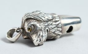 A SILVER DOG'S HEAD WHISTLE.