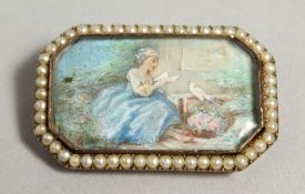 A GEORGIAN 18CT GOLD BROOCH with a miniature of a lady with seed pearl surround, 23.5cm long