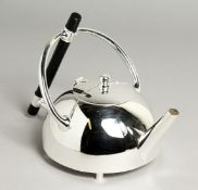 A CHRISTOPHER DRESSER DESIGN SILVER-PLATED CIRCULAR TEA POT.