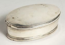 AN OVAL SILVER BOX with blue velvet liner, 4.75ins. London, 1912.