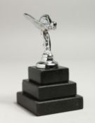 A MINIATURE ROLLS ROYCE MASCOT, 7cm on a stand.