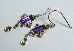 A PAIR OF SILVER-PLATED PERIDOT, DIAMOND, AND AMETHYST EARRINGS.