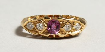 AN 18CT WHITE GOLD RUBY AND DIAMOND RING.
