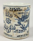 A CHINESE BLUE AND WHITE DRAGON BRUSH POT. 5.5ins high.