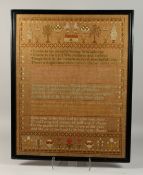 A GOOD LARGE FRAMED AND GLAZED SAMPLER, dated 1897. 32ins x 25ins.