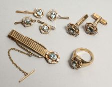 A VERY GOOD GOLD AND AQUAMARINE DINNER JACKET SUITE