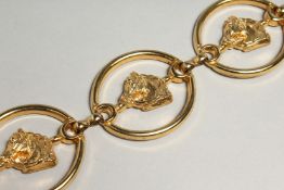 A DESIGNER GILT BELT.