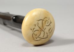 A VICTORIAN BRIAR WALKING CANE with ivory and key pattern handle. 31ins long.