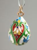 A RUSSIAN SILVER AND ENAMEL EGG PENDANT, 2.5cm