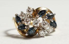 A GOLD SAPPHIRE AND DIAMOND CLUSTER RING