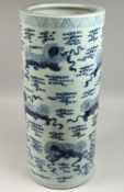 A CHINESE BLUE AND WHITE STICK STAND. 23ins high.