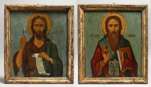 A GOOD RUSSIAN ICON OF A SAINT, double sided, framed. 12ins x 10ins