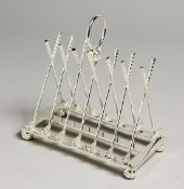 A SILVER-PLATED SIX DIVISION TOAST RACK with cross golf clubs.