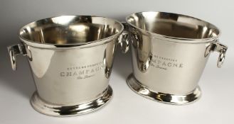 A PAIR OF OVAL SILVER-PLATED WINE COOLERS with ring handles. 13ins long.