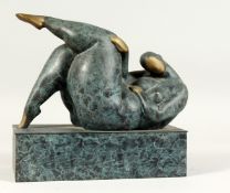 A SMALL MODERN PATINATED BRONZE of an overweight lady in seductive pose on a rectangular base. 10ins